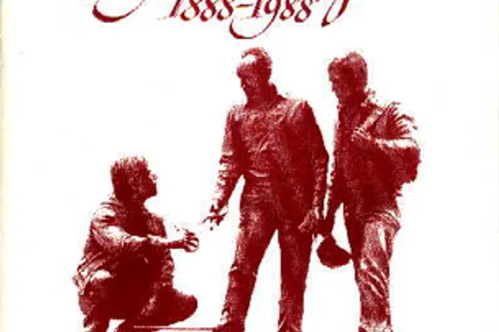Silhouette of three men interacting